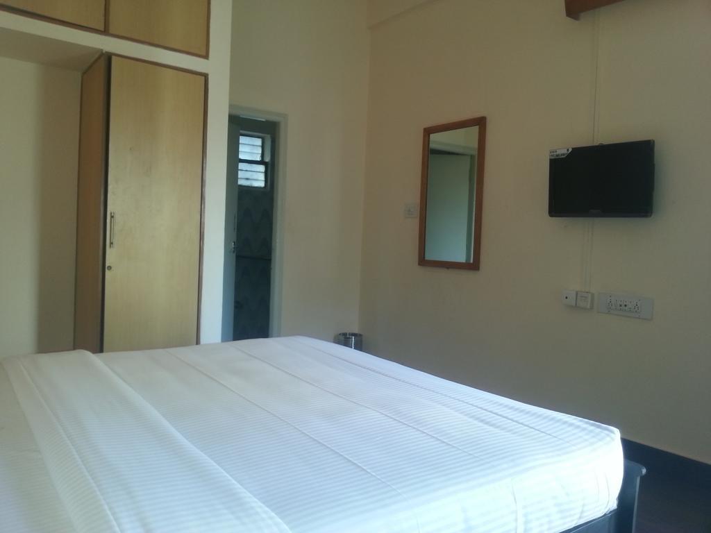 Hotel Sri Sai Comforts Bengalúr Pokoj fotografie
